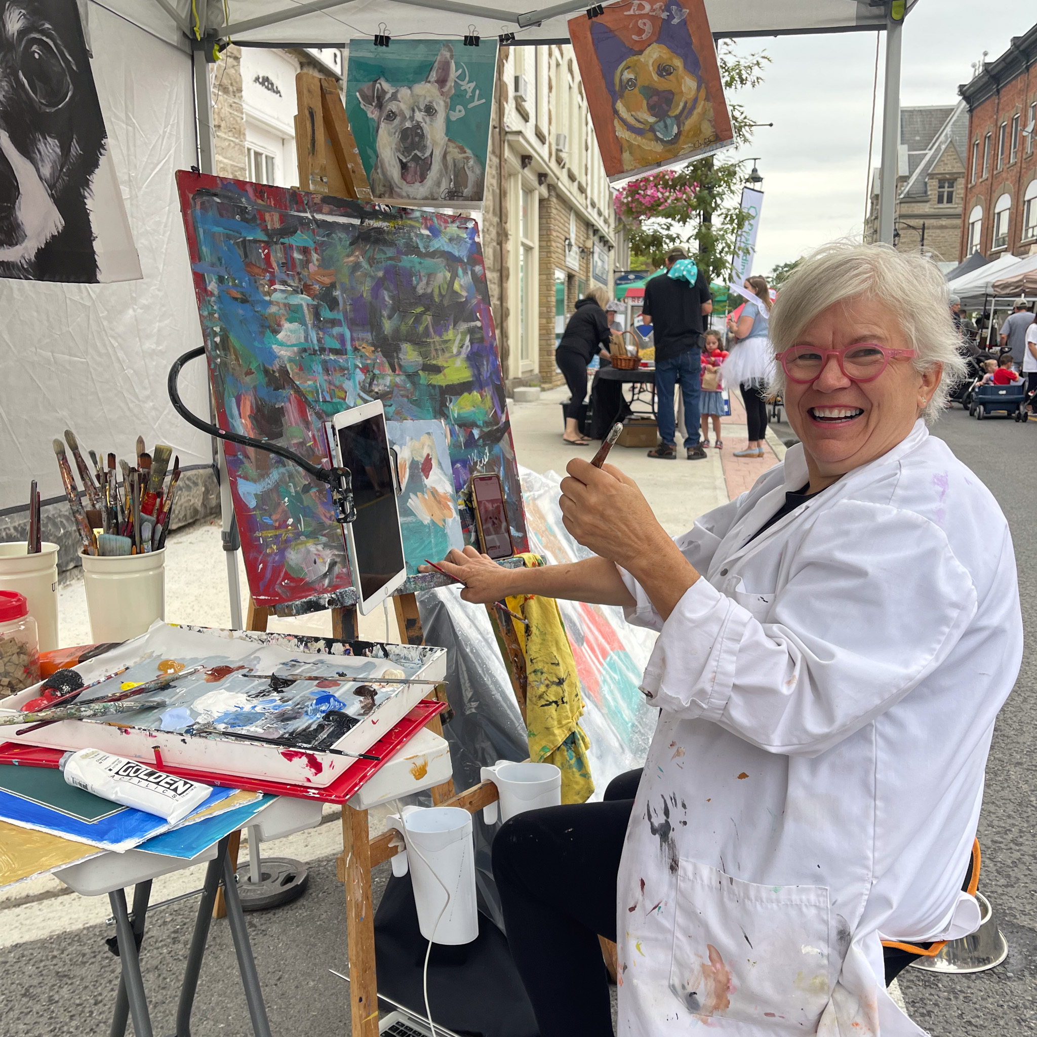 Artist paints at Summerfest Market