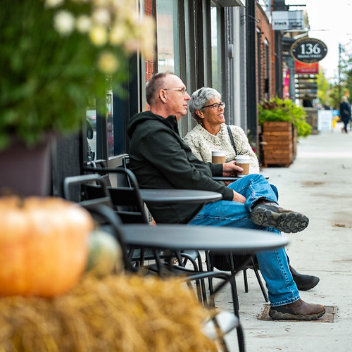 PUMPKINFEST -02 Couple enjoys an outdoor cafe patio